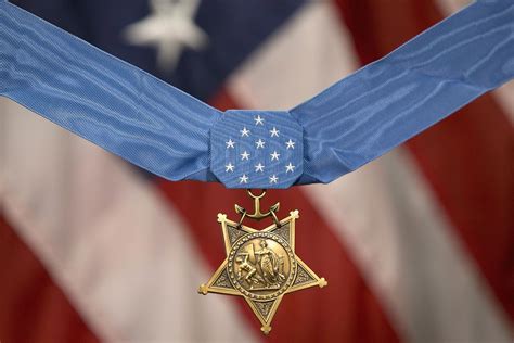 Magazine - Medal of Honor Recipient Awarded with Commemorative MK25 Pistol and Documentary