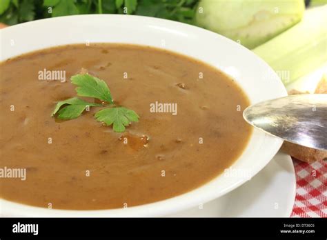 Oxtail soup with beef on a light background Stock Photo - Alamy