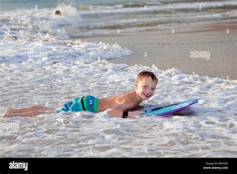 6-year-old Boy With A Kickboard Nai Harn Beach Phuket Island Southern Stock Photo, Royalty Free ...