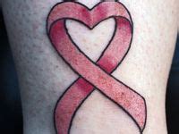 44 Heart Shaped Ribbon Tattoo ideas | ribbon tattoos, tattoos, heart shapes