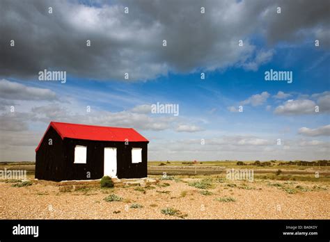 Old corrugated metal shack on the beach at Rye in East Sussex Stock Photo - Alamy