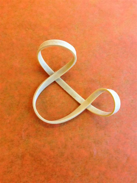 Rubber band ampersand | Ampersands, Ampersand art, Ampersand