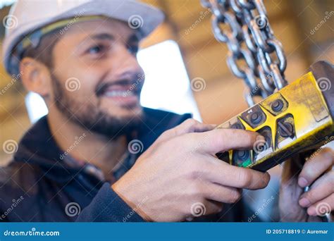 Man in Factory Preparing Equipment for Welding Stock Image - Image of employee, metalwork: 205718819