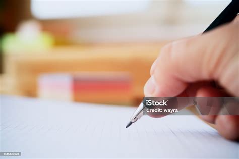 Hand Holding Pencil Stock Photo - Download Image Now - Writing - Activity, Handwriting, Document ...