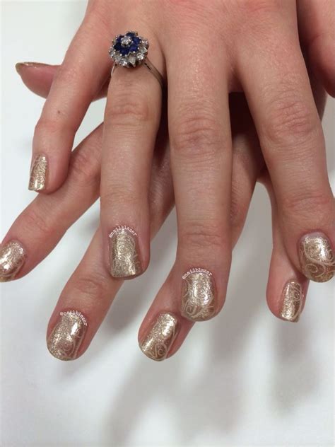 More gold swirls for a colleague who was looking for something subtle! Two coats of Nails Inc ...