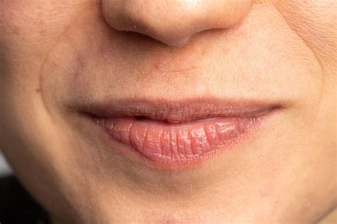 Premium Photo | Closeup of a persons lips showing natural texture and details