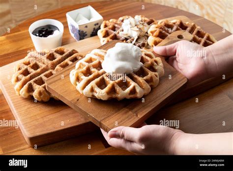 Jeju, tangerine tea, almond croffle, croissant, waffle, plain Stock Photo - Alamy