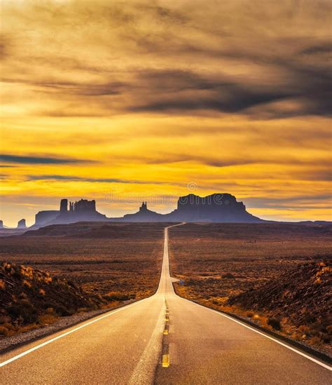 Desert Road Leading To Monument Valley at Sunset Stock Photo - Image of dusk, cloudy: 112021552