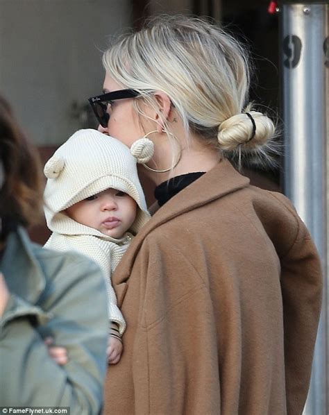 Ashlee Simpson holds her daughter Jagger while out with husband Evan Ross | Daily Mail Online