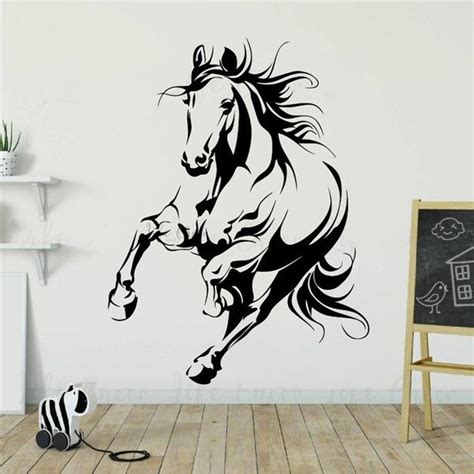 a wall decal with a horse running