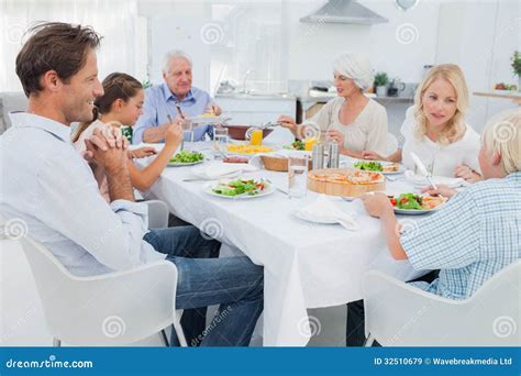 Extended Family At The Dinner Table Royalty Free Stock Images - Image: 32510679