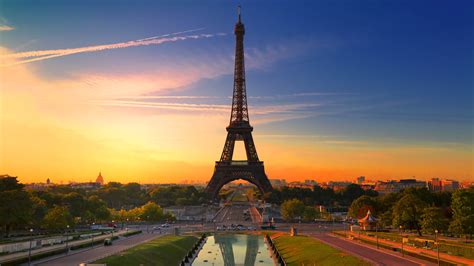 Straight View Of Eiffel Tower Paris During Sunrise With Blue Sky Background 4K 5K HD Travel ...