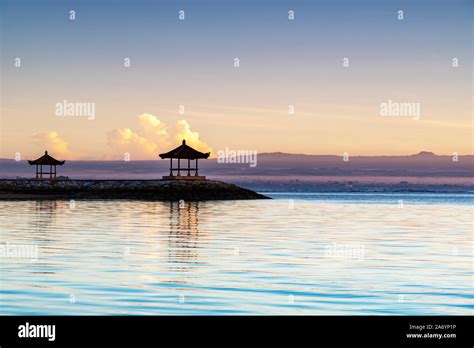 Sunrise at Pantai karang Beach in Sanur Bali Indonesia Stock Photo - Alamy