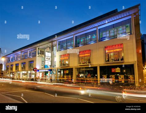 Dusk view of the Fulham Broadway shopping centre on Fulham road in Stock Photo, Royalty Free ...