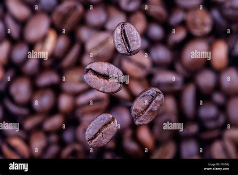 falling coffee beans closeup Stock Photo - Alamy