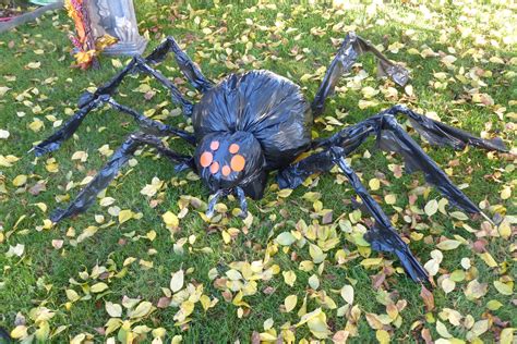 My DIY giant spider, made of garbage bags with newspaper stuffing for the head/body and… | Cheap ...