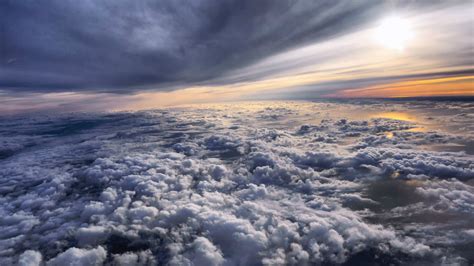 Flying above the clouds at sunset wallpapers and images - wallpapers, pictures, photos