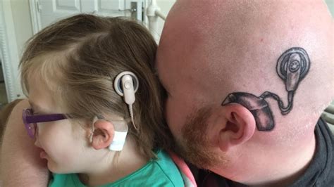 Dad gets tattoo of his daughter's brain shunt | ITV News Central