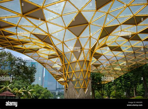 The Perdana Canopy, a unique structure of modern geometric design. blends into nature in the ...