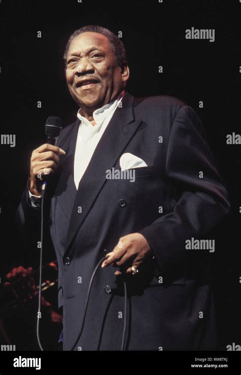 Blues singer Bobby "Blue" Bland is shown forming on stage during a concert Stock Photo - Alamy