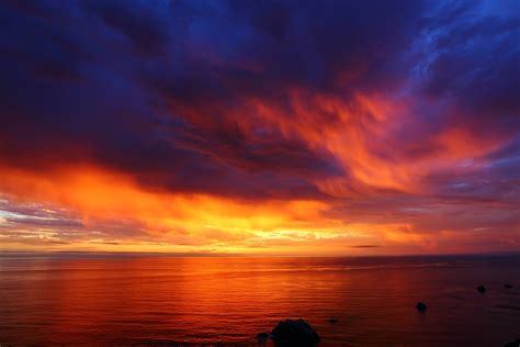 Download Orange (Color) Horizon Cloud Sky Sea Ocean Nature Sunset 4k Ultra HD Wallpaper