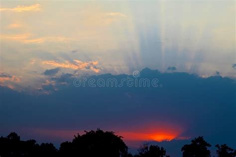 Sun Rays during Sunset Showing Silhouette Stock Image - Image of india ...