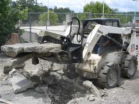 Skid Steer Attachments - Daniel Mfg. Inc.