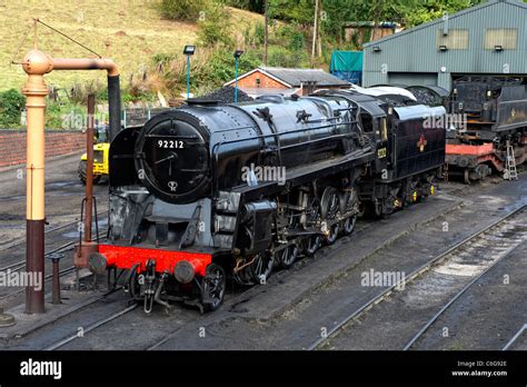 British Railways Standard Class 9F locomotive No. 92212 in the sidings at Bridgnorth Station on ...