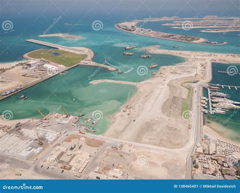 Construction of an Artificial Island Palm Jumeirah with Construction Equipment in Dubai. Stock ...