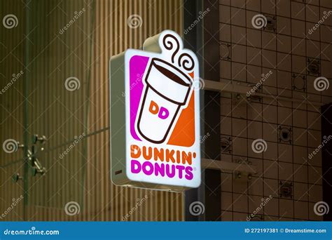 Dunkin Donuts Sign. Dunkin Donuts is a Doughnut Company and Coffeehouse Chain Editorial Photo ...