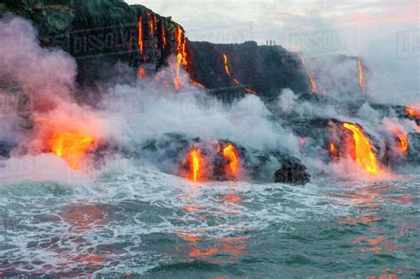 Lava flow from Kilauea Volcano flowing into the Pacific Ocean, Kalapana Coast, Big Island ...