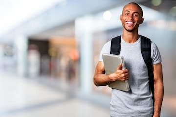 Premium Photo | Male student with backpack on background