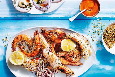 Grilled seafood platter with romesco sauce and herb crumbs - Recipes - delicious.com.au