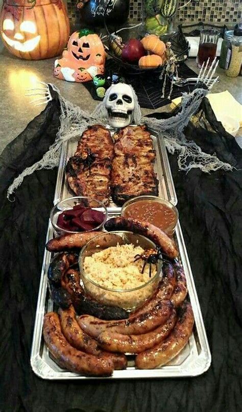 Halloween Skeleton Buffet - ribs, sausage intestines, liver beet slices, maggot fried ri ...