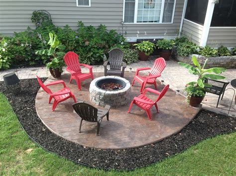 New Stamped concrete Patio with built in fire pit. What a great addition to this already ...