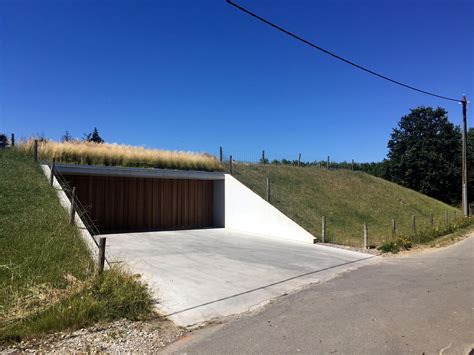 Green Roofs and Great Savings | Bunker home, Earth sheltered homes, Modern barn house