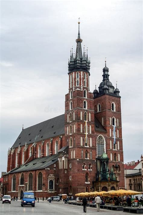 Kosciol Mariacki, or Saint Mary Church, on Krakow Main Square, Rynek Glowny. Editorial ...