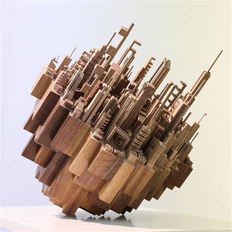 Stunning Abstract Wooden Sculptures Featuring Intricately Carved Cityscapes From Around the World