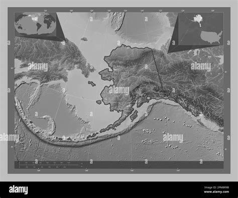 Alaska, state of United States of America. Grayscale elevation map with lakes and rivers. Corner ...