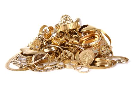 Pile of Gold Jewelry - Watch and Wares