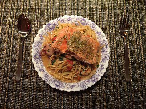 [I Ate] Seafood linguine made with fresh clams, mussels, and squid, served with a sous vide ...