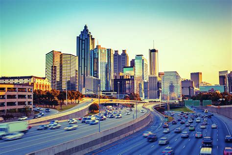 Atlanta Skyline And Highway At Sunset by Moreiso