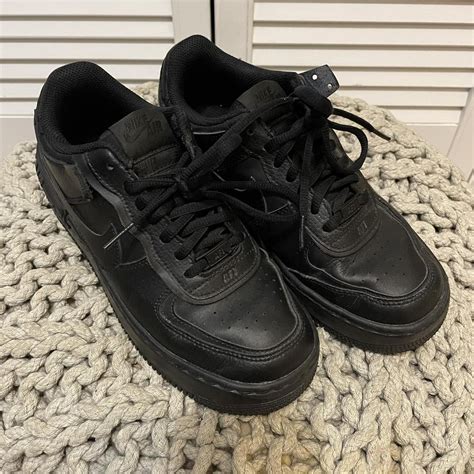 Black Nike Air Force. Size 5. Worn but still great... - Depop