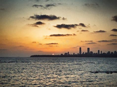 The Sunset Skyline of Marine Drive Mumbai. Stock Image - Image of footwear, blue: 184700813