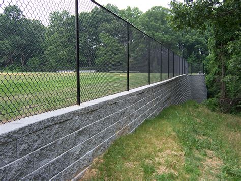 Fence Post in Retaining Wall | CornerStone Wall Solutions