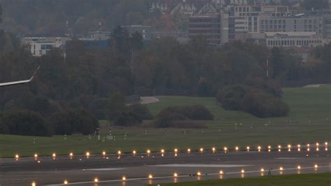 Super slow motion shot of airplane landing at the airport 30556900 Stock Video at Vecteezy