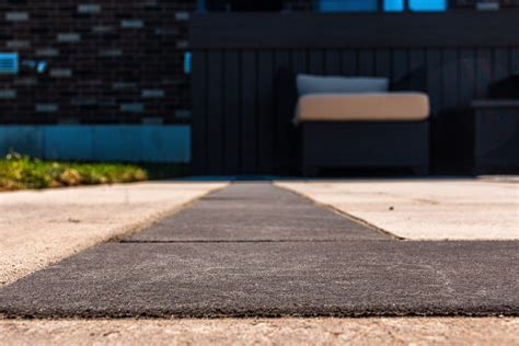 Polymeric Sand vs Regular Sand for Pavers: 8 Differences