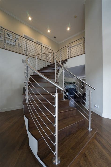 Curved Stainless Steel Rod Railings | Bella Stairs, LLC | Archinect