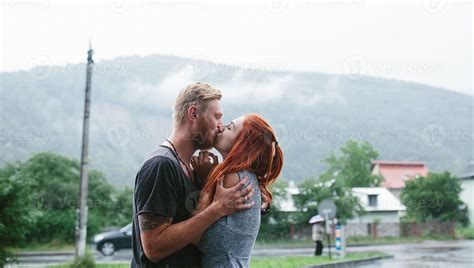 beautiful couple hugging in the rain 11488384 Stock Photo at Vecteezy