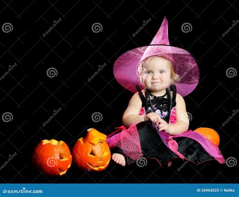 Halloween Baby Witch with a Carved Pumpkin Stock Image - Image of charming, holding: 26963023